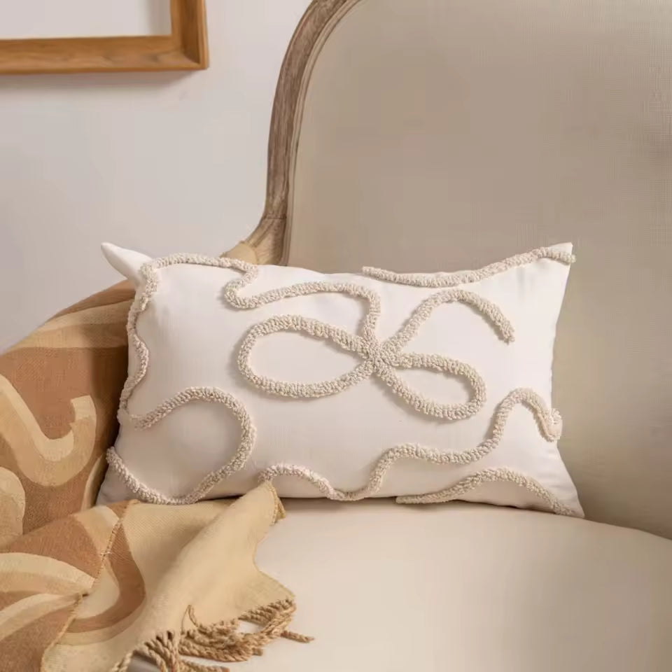 Coussins beiges abstraits