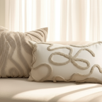 Coussins beiges abstraits